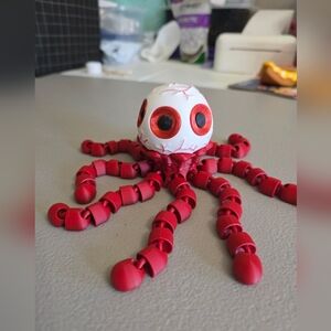 Red and White Octopus Toy